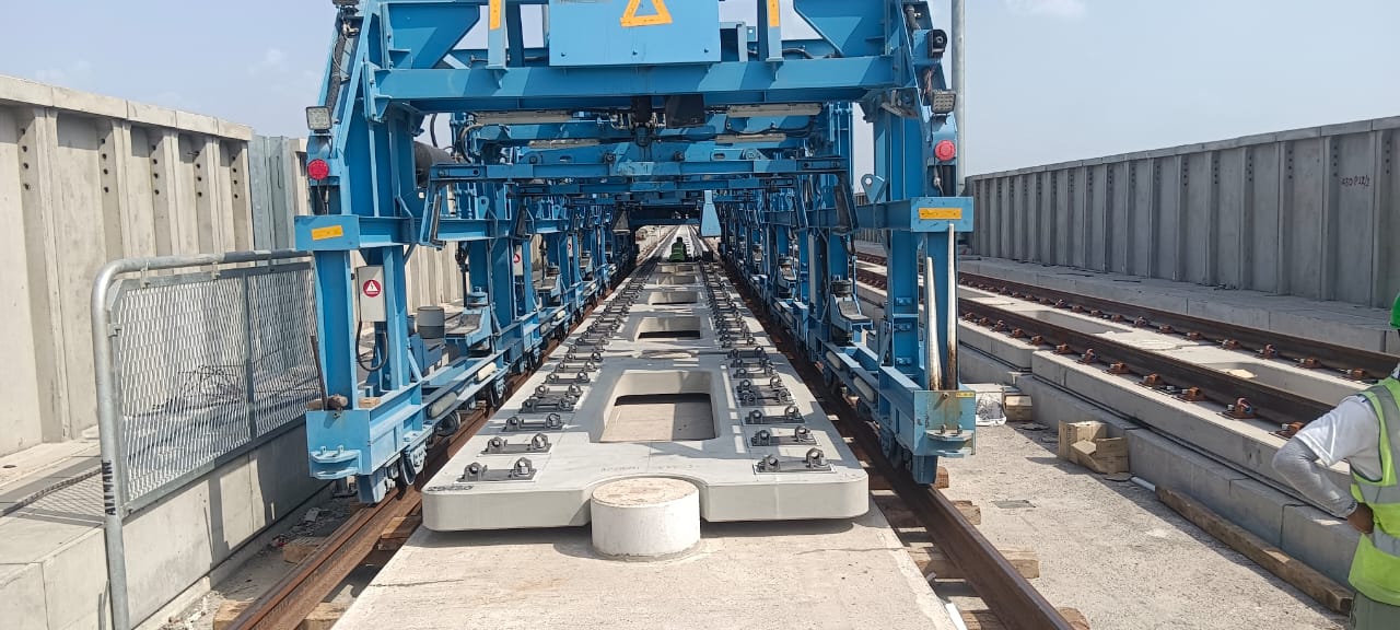 Gantry crane over precast track segments